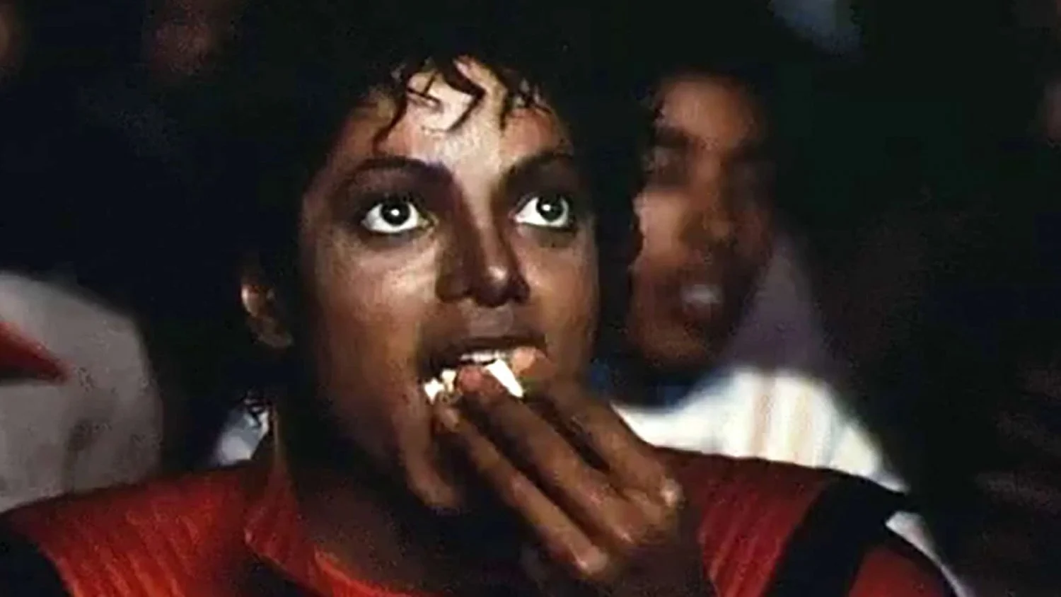 Michael-Jackson-Popcorn-GIF-Meme-Eating-Popcorn-Featured-StudioBinder.webp