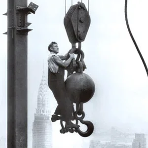 man-on-crane-hook.webp