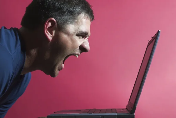 man-yelling-at-computer.webp