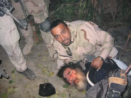 top secret picture iraq pesmercas leave saddam us troops look saddam and his bag clothes.webp