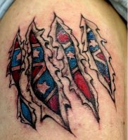 1325960166rebel-flag-shoulder-tattoo-with-skin-rip.jpg