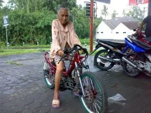 Grandma+riding+motorbike.webp