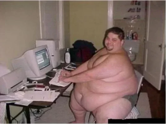 really-fat-guy-on-computer.webp