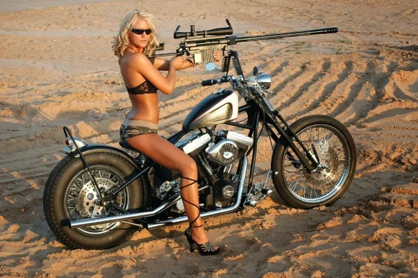 girl-with-gun-50cal-chopper.webp